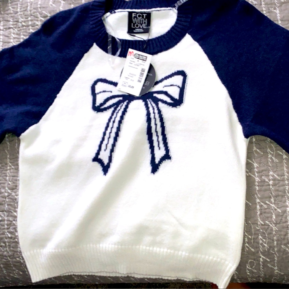 Navy and White Sweater with Bow Design